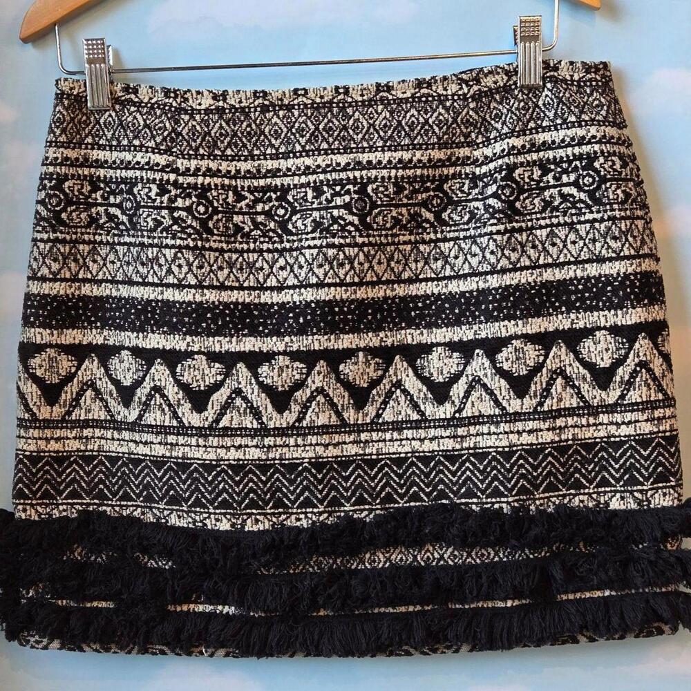 Playful textured woven Mini skirt with zipper back and fringe